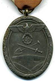 Медаль, изготовленная из бронзированного цинка.