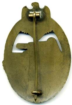Аверс и реверс знака «За танковый бой» в бронзе.