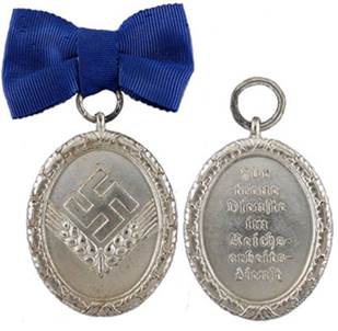 Аверс и реверс медали 12 лет выслуги для женщин.