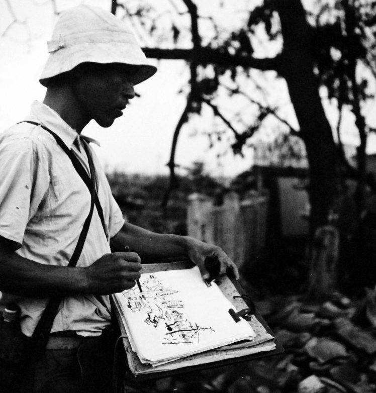 Японский художник рисует картину разрушений города после ядерной бомбардировки Хиросимы. Сентябрь 1945 г.