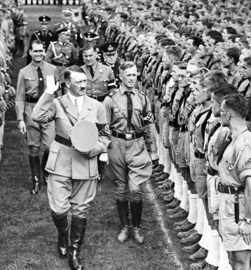 Адольф Гитлер, Бальдур фон Ширах, Рудольф Гесс на митинге в Нюрнберге. 1938 г.