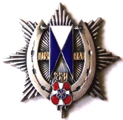 Аверс и реверс офицерского полкового знака 19-го Волынского уланского полка им. генерала Эдмунда Ружицкого.