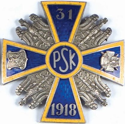 Аверс и реверс офицерского полкового знака 31-го полка Канёвских стрелков.