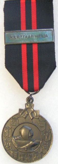 Аверс и реверс бронзовой медали «За зимнюю войну» для иностранцев. 