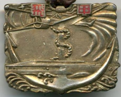 Аверс и реверс памятного жетона 3-го выпуска кадетов в 1940 году.
