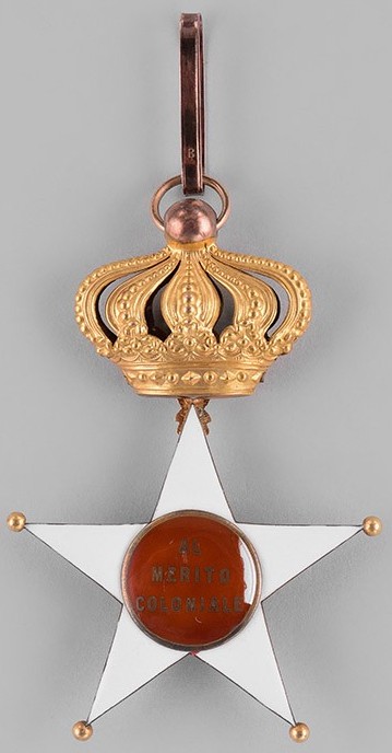 Аверс и реверс знака Командор Колониального ордена Звезды Италии. 