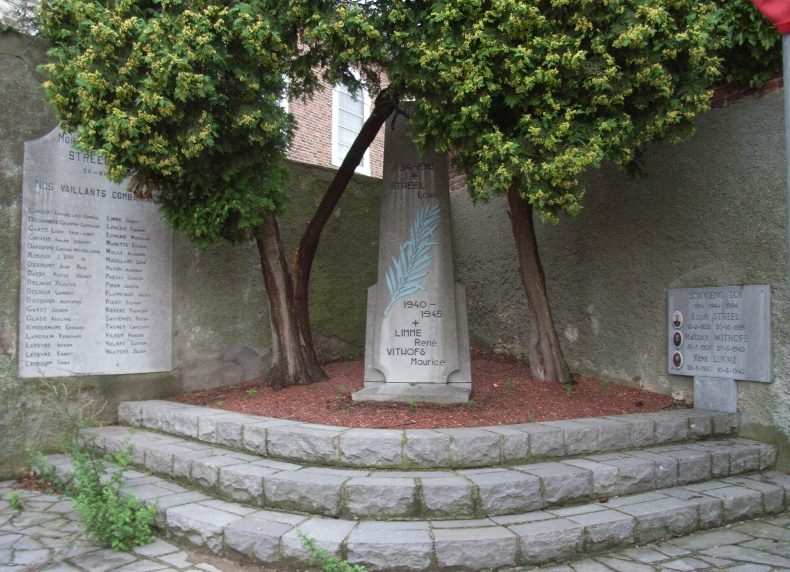 Коммуна Avernas-le-bauduin. Памятник погибшим в обеих войнах у церковных стен.