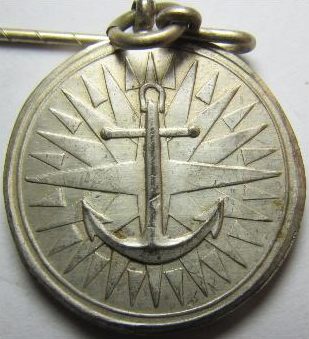 Знак морского командира 2-го класса, который присваивался капитанам эсминцев, фрегатов или других кораблей среднего класса.