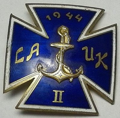 Аверс и реверс знака выпускника офицерской военно-морской школы.