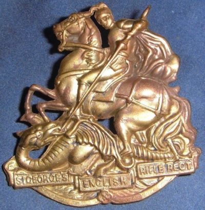 Аверс и реверс знака на шляпу военнослужащих 36-го пехотного батальона.