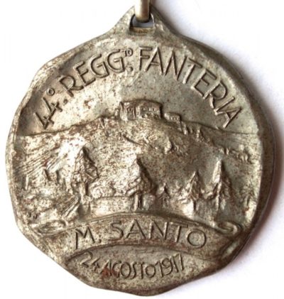 Аверс и реверс памятной медали 44-го пехотного полка бригады «Forli». Полк сформирован в 1859 году во Флоренции. Медаль изготовлена из бронзы с серебрением, диаметр - 28 мм.