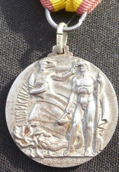 Аверс и реверс памятной медали добровольцам из Равенны.