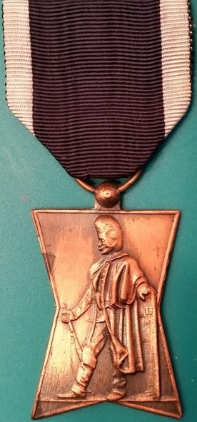 Аверс и реверс памятной медали бельгийских жандармов.