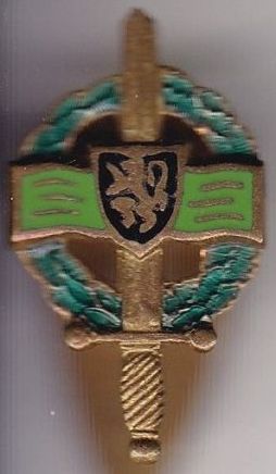 Петличный знак Королевской Федерации военных за границей.