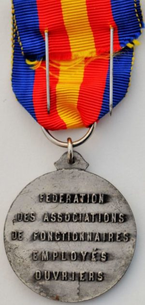 Аверс и реверс медали Ассоциации ветеранов жертв войны.