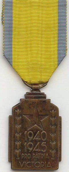 Знак медали «За службу в колониях во время войны 1940-1945».