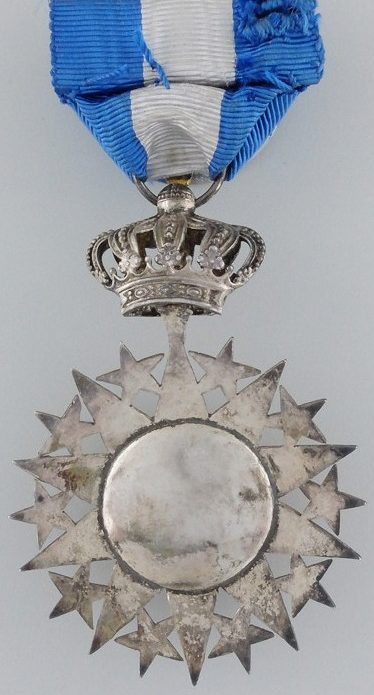Аверс и реверс знака Офицера ордена Нишан-эль-Ануара.