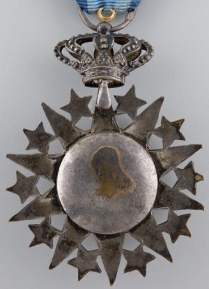Аверс и реверс знака Кавалера ордена Нишан-эль-Ануара.