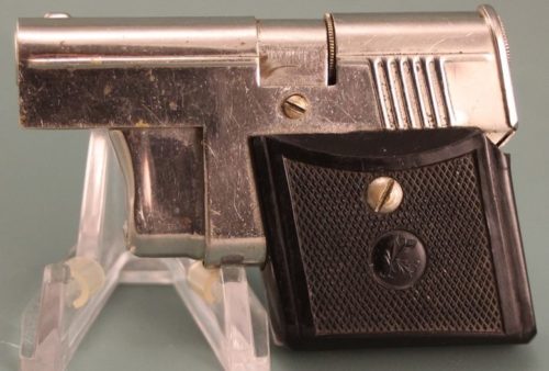 Зажигалка-пистолет немецкой фирмы Müller & Grünstein, выпускалась с 1932 года.