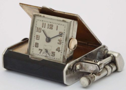 Зажигалка-часы Hermann Watchlighter, выпускалась в 1931 году.