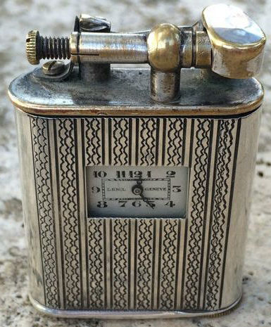 Зажигалки-часы Lenil Genève, выпускались в 1930-м году. 