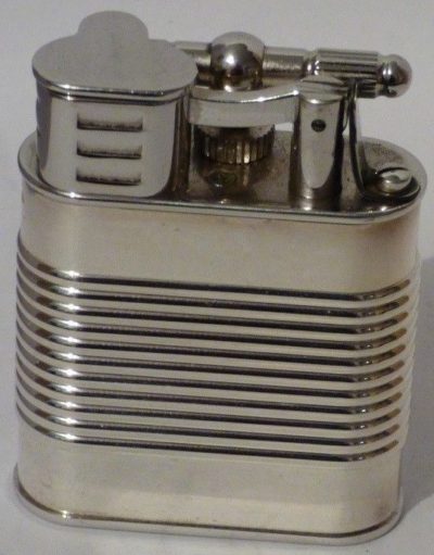 Зажигалки «Unique Sport» фирмы Dunhill, выпускались в 1930-х годах.