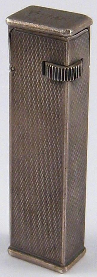 Зажигалки «Tallboy» фирмы Dunhill, выпускались с 1940-го года.