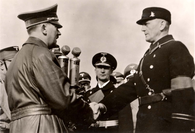 Гитлер приветствует руководителя местных нацистов Каймана. 24 марта 1939 г. 