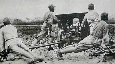 Китайские солдаты с противотанковым орудием. Шанхай, 1937 г.