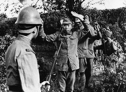 Китайские военнопленные, захваченные японской армией. 1943 г. 