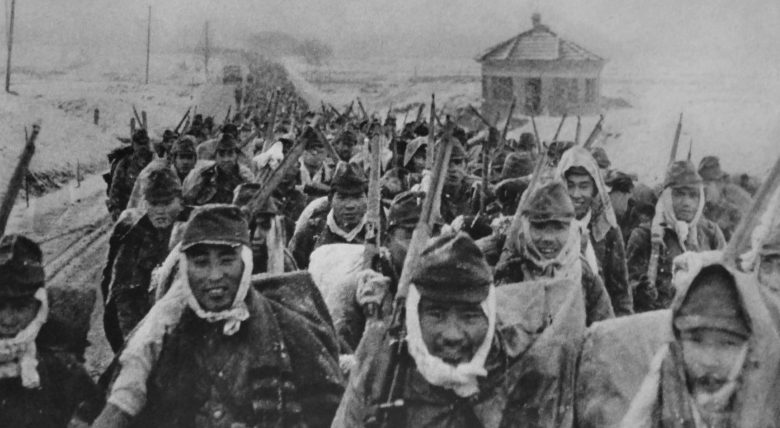 Солдаты японской 16-й дивизии на марше в Китае. Январь 1938 г. 