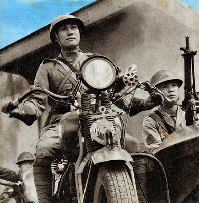 Японские солдаты во время вторжения в Гонконг. Декабрь 1941 г.