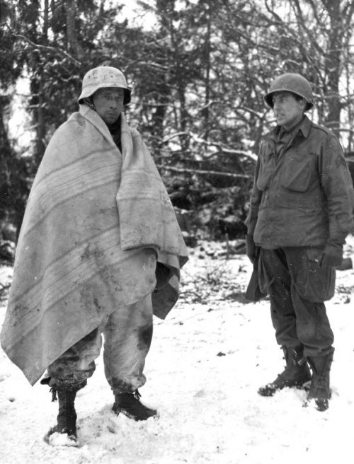 Пленный немецкий гренадер из частей СС, захваченный в Бельгии. Январь 1945 г.