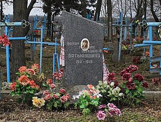 с. Воскодавинцы Красиловского р-на. Братская могила советских воинов на кладбище.