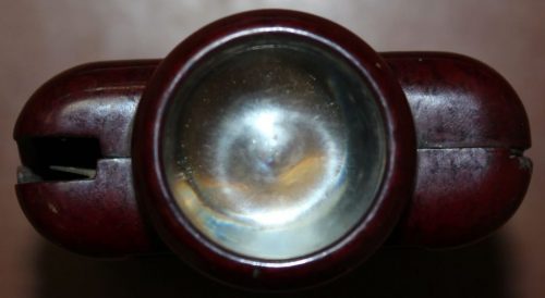 Батарейный фонарь «Zeiler №4350 D.R.P.» в бакелитовом корпусе с линзой.