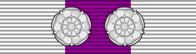 Орденская планка Военного креста с розетками повторного награждения.