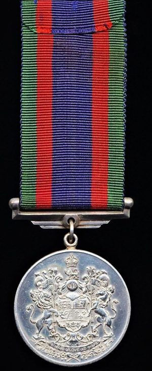 Аверс и реверс медаль канадской добровольческой службы.