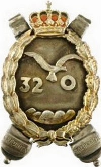 Знак 32-го гаубичного полка. 