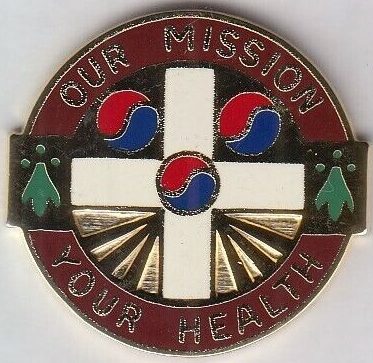 Знак 121-й больницы общего профиля армии США.