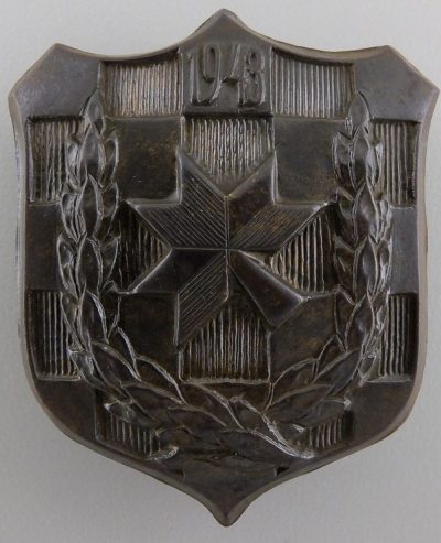 Знак школы офицеров.
