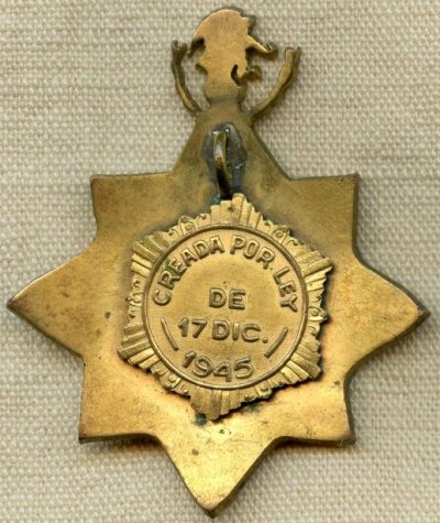 Аверс и реверс медали «За военно-морские технические заслуги» 1-го класса.