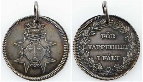 Аверс и реверс серебряной медали «За храбрость на поле боя».