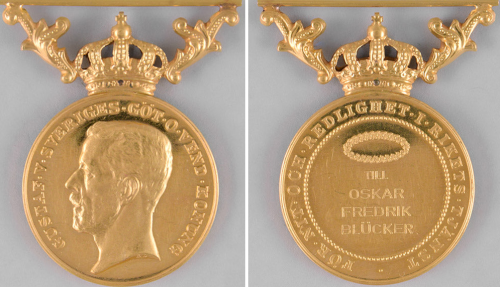 Аверс и реверс золотой медали «За усердие и преданность».