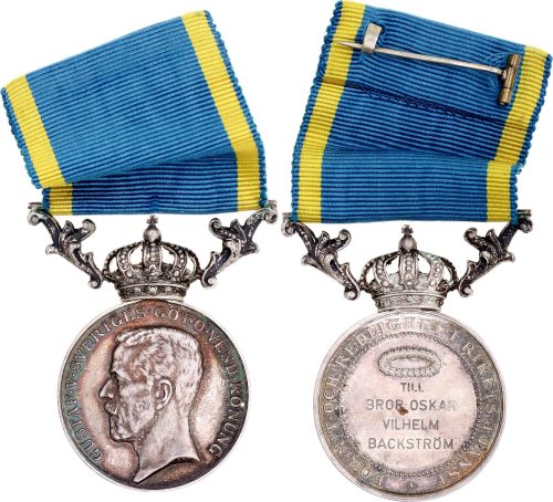 Аверс и реверс серебряной медали «За усердие и преданность».