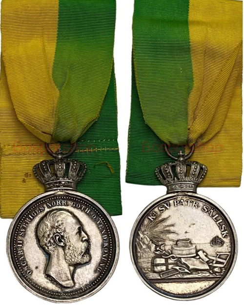 Аверс и реверс серебряной медали «За долгую верную службу», учрежденную Королевским патриотическим обществом в 1933 году.