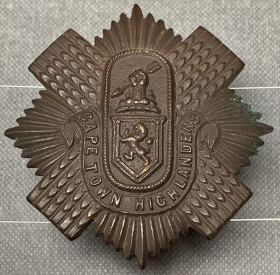 Значки Кейптаунских горцев.
