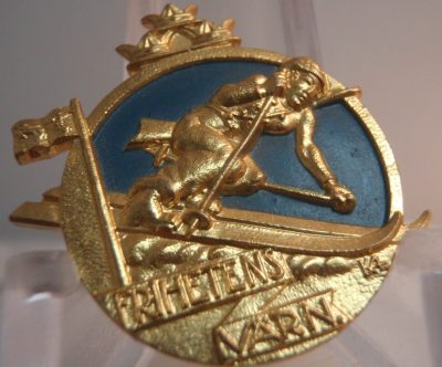 Золотой военный биатлонный значок.