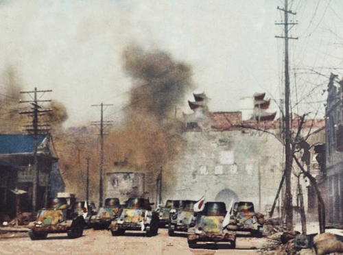 Японские танкетки атакуют ворота Нанкина. 1937 г.